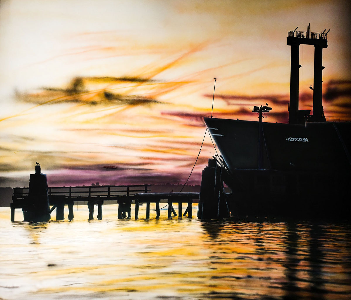 orangey streaked sky, a pier, silhouette of a working boat
