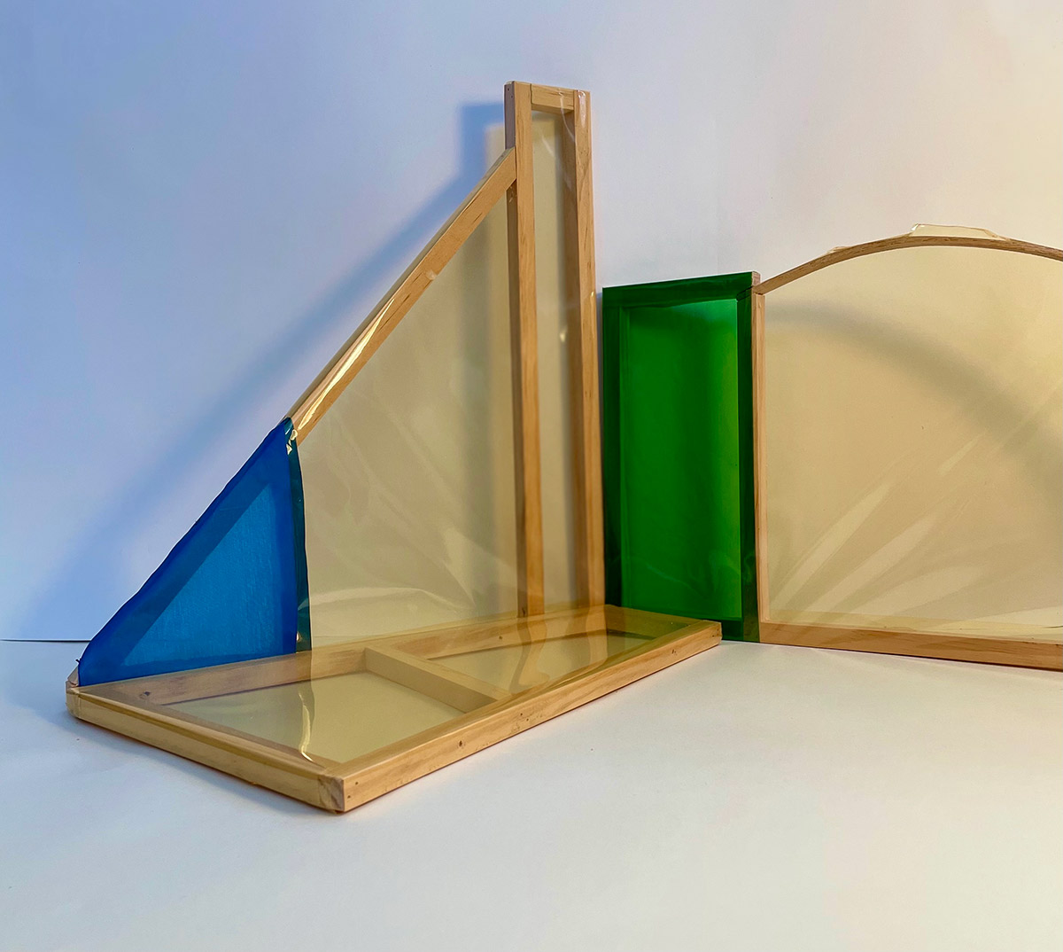 geometric structure of metal, wood, and colored transparent plastic