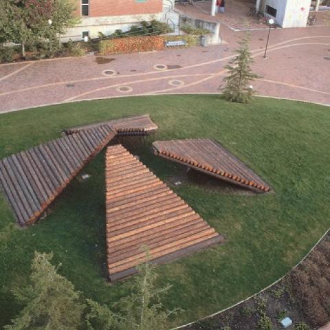 Aerial view of Llyod Hamrol's sculpture Log Ramps. Full description in body text.