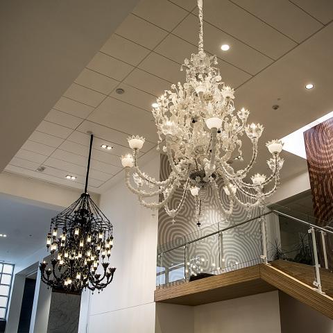 two chandelier sculptures hanging inside the Viking Union common area