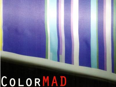 purple, aqua, and white vertical stripes and text reading "color mad"