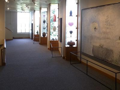 a gallery with numerous woven textile artworks from the same series