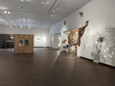 view of the gallery with several large three dimensional works on display