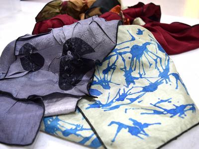 shibori dyed cloth in varying shades of indigo
