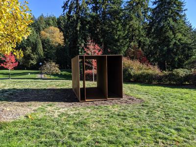 minimalist steel box sculpture with interior subdivisions by Donald Judd